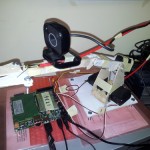 Harmone: a teaching low cost robotic arm with webcam