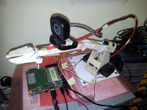 Harmone: a teaching low cost robotic arm with webcam